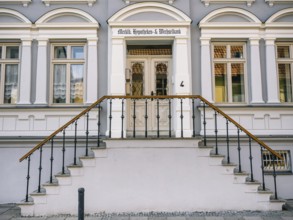 House front with double staircase in the town of Malchow, Mecklenburg-Vorpommern, Germany