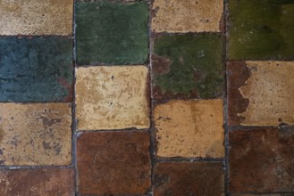 Floor made from old coloured tiles, Netherlands
