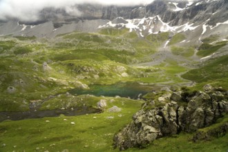 The Lacs des Aires lake in the Cirque de Troumouse basin in the Pyrenees National Park near