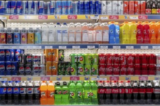 Sales shelf Red Bull, beverages Pepsi, Coca Cola