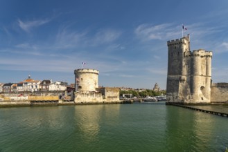 Harbour entrance to the old Vieux Port with the medieval towers Tour St.-Nicolas and Tour de la
