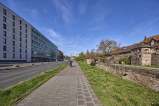 Footpath and cycle path, trees, meadow, city fortification, city wall, pedestrians and cyclists as