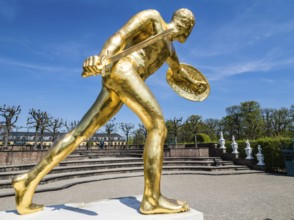 Golden sculpture, warrior with shield and sword, Herrenhausen Gardens, Baroque garden at castle