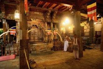 Temple of the sacred Tooth Relic or Sri Dalada Maligawa, Drummer and musician in front of the Holy