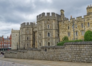 Windsor Castle in front of a cloudy sky. Windsor, Berkshire, England, Great Britain