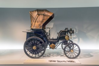 Daimler belt-driven car Vis-à-Vis from 1896. The Mercedes-Benz Museum in Stuttgart presents a