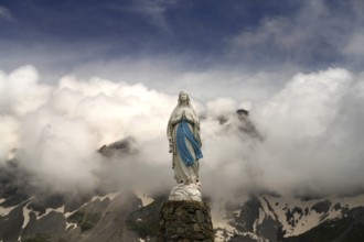 Statue of the Madonna La Vierge de Troumouse in the Cirque de Troumouse basin in the Pyrenees