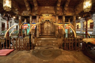 Temple of the sacred Tooth Relic or Sri Dalada Maligawa, Holy Shrine decorated with elephant tusks,