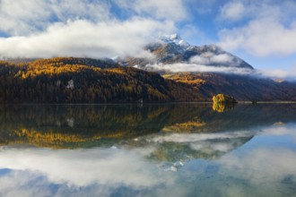 Fog over Lake Sils with Piz da la Margna in the background, Upper Engadine, Canton Graubünden,