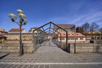 Pedestrian bridge, lantern, pavement, city fortification, city wall, historic buildings, trees,