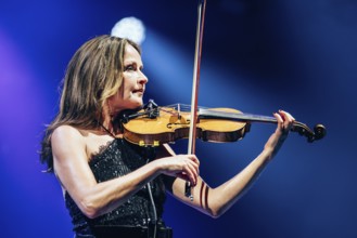 Sharon Corr, violinist and backing vocals by The Corrs live at the Tollwood Festival in Munich on