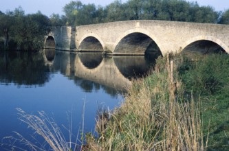 Historic arched stone bridge built 1807, River Thames, Sutton Bridge, Culham, Oxfordshire, England,