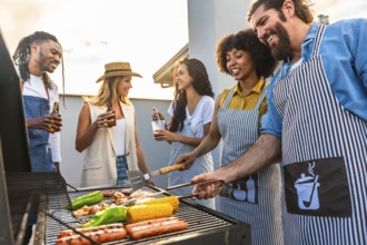 Chefs grilling delicious meat and vibrant vegetables while enjoying cold beer on a rooftop during a