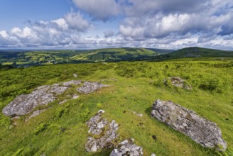Stones and landscape at the top Tor tor rock hill in Dartmoor National Park. Widecombe-in-the-Moor,