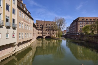 Heilig-Geist-Spital, historical building, river Pegnitz, facade, windows, trees, symmetrical