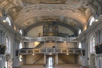 Interior with organ loft of the baroque parish church of St Nicholas, 1725, Tannheim, Austria