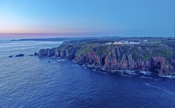 Land's End, landscape and hotel on the Atlantic, at dusk. Land's End, the tip of the headland in