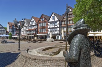 The statue of the night watchman on the market square in the historic old town of Rinteln. Lower