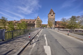 Schuldturm, historical buildings, car and pedestrian bridges, metal railings, blue sky,