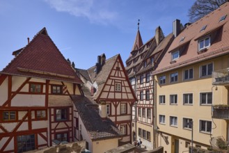 Historic half-timbered houses, residential buildings, gables, pointed roofs, facade, windows, blue