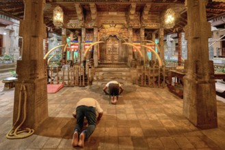Pilgrims praying in front of the Holy Shrine, Temple of the sacred Tooth Relic or Sri Dalada