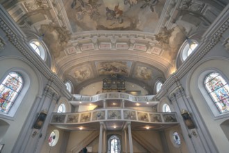 Interior with organ loft of the baroque parish church of St Nicholas, 1725, Tannheim, Austria