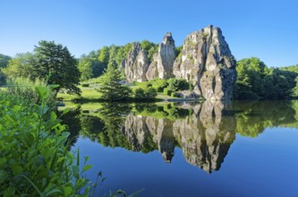 The Externsteine, a sandstone rock formation around 40 metres high in the Teutoburg Forest, are a