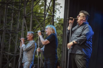 Jens Sembdner, Tobias Künzel and Sebastian Krumbiegel, singer of the band Die Prinzen at the