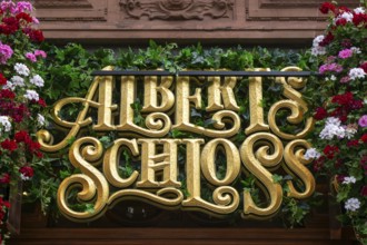 Sign for Albert's Schloss, bar beer hall restaurant, Shaftesbury Avenue, central London, England,