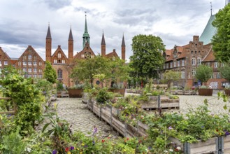 Flower boxes at Geibelplatz and Heiligen-Geist-Hospital in the Hanseatic city of Lübeck,