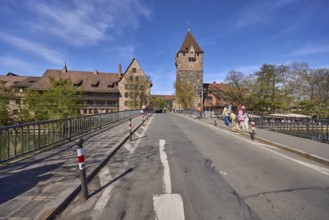 Schuldturm, historical buildings, car and pedestrian bridges, metal railings, pedestrians as