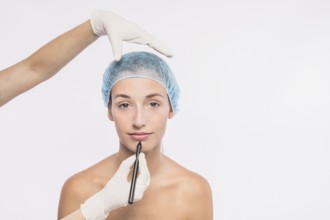 Pretty woman preparing injection by doctor
