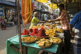 Turmeric kumkum and other pooja puja things in a shop at Swamimalai near Kumbakonam, Tamil Nadu,