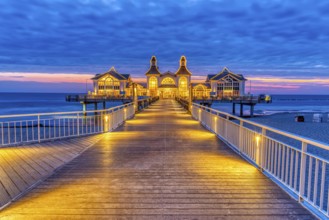The beautiful pier in Sellin on the island of Rügen in front of sunrise