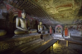 Dambulla, Sri Lanka, August 15, 2018: Buddha statues inside the historical Dambulla Cave Temple