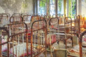 Beds in dormitory, Golden Key Kindergarten, Lost Place, Prypyat, Chernobyl exclusion zone, Ukraine,