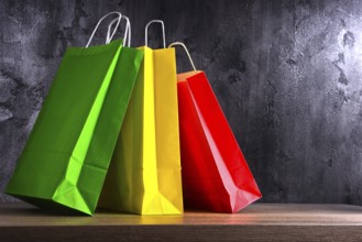 Composition with colorful paper shopping bags
