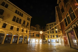Lighting in the historic centre, night shot, Campo San Luca, Venice, Italy