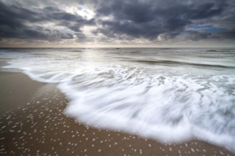 North sea waves on sand beach, Zandvoort, Netherlands