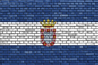 Flag of Jerez painted on brick wall