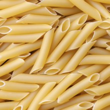 Penne lisce macaroni, italian pasta background