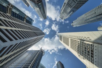 Singapore, city skyline looking up under skyscraper building business district