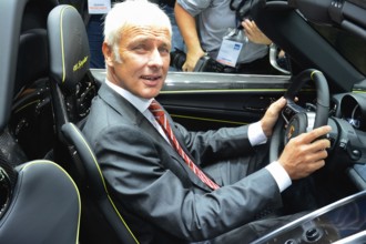 Porsche CEO Matthias Müller in thePorsche 918 at the IAA 2013