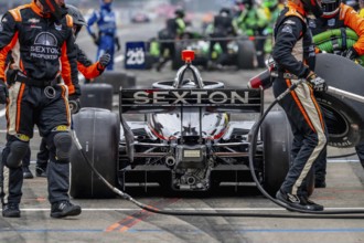 INDYCAR Series driver, SANTINO FERRUCCI (14) of Woodbury, Connecticut, brings his car in for
