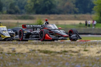 INDYCAR Series driver, SANTINO FERRUCCI (14) of Woodbury, Connecticut, races through the turns