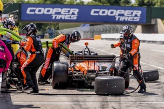 MARCUS ARMSTRONG (11) of Christchurch, New Zealand comes down pit road for service during the Honda