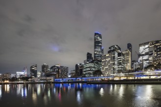 MELBOURNE, AUSTRALIA - JULY 5, 2024: Melbourne skyline as seen at dusk from Queens Bridge near