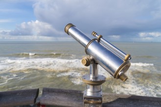 Coin operated observation binocular at the Dutch north sea coast