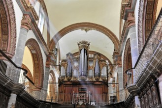 Oaxaca, Mexico, Central America, Baroque organ in a church with richly decorated pipes and wooden