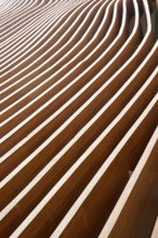 The outer wall of a commercial building representative waves of the sea
